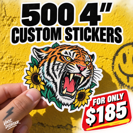 Custom vinyl sticker with tiger face graphic, 4-inch, held by hand