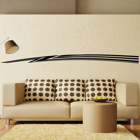 Black vehicle pinstripe vinyl decal with zigzag striping lines on wall