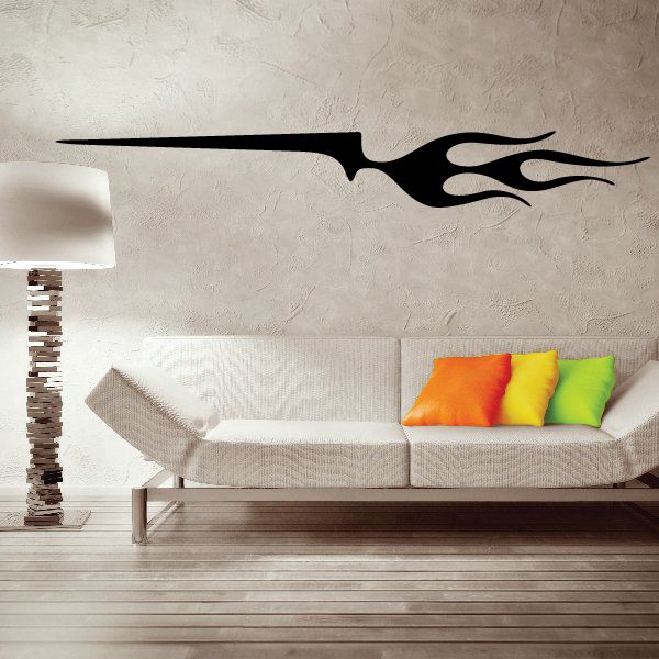 Black vehicle pinstripe vinyl decal with flame accents on wall