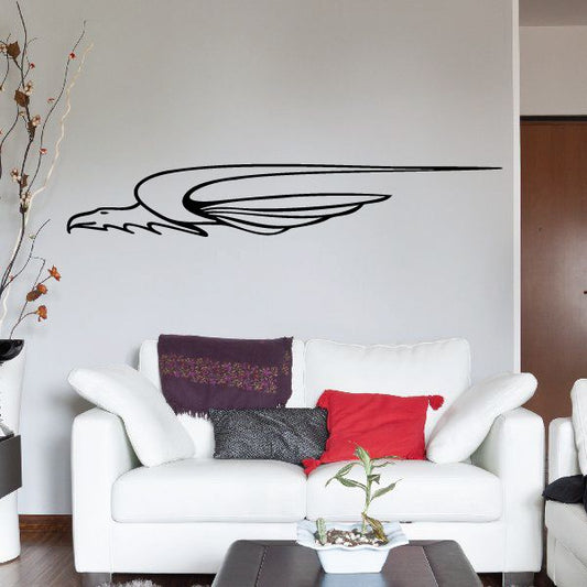 Black pinstripe vinyl vehicle decal with swooping wing graphic on a wall surface
