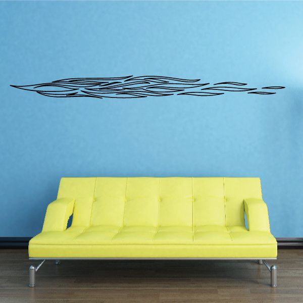 Vehicle pinstripe vinyl decal with black tribal-style stripe, long horizontal strip.