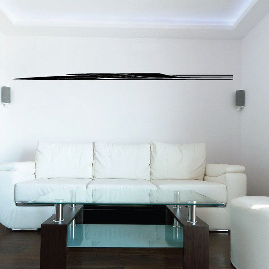 Black vinyl pinstripe decal, two thin horizontal stripes on wall above couch.