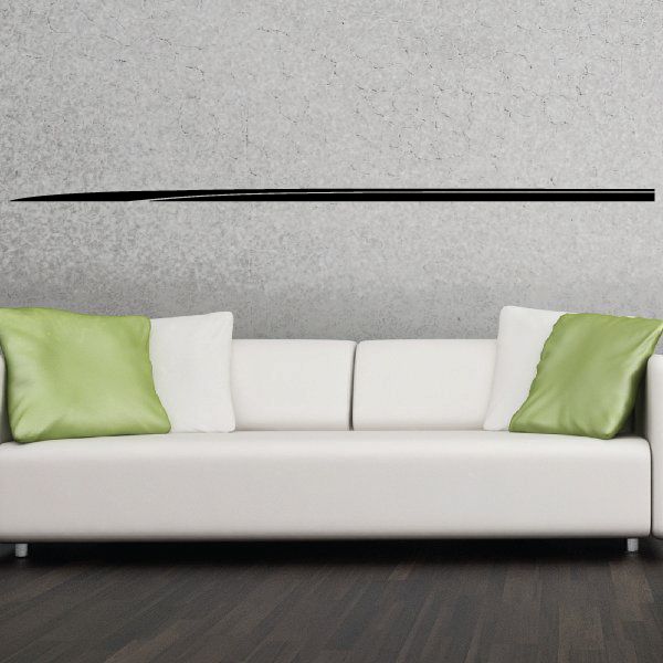 Vehicle pinstripe vinyl decal, long black stripe on wall above sofa