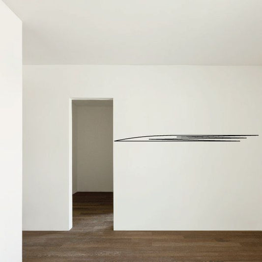Pinstripe vinyl decal with two thin black stripes and angled end on wall