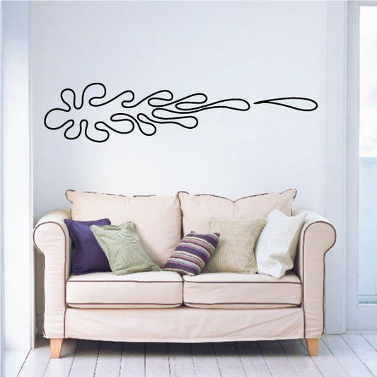 Black pinstripe vinyl vehicle decal with long swooping flame-like lines
