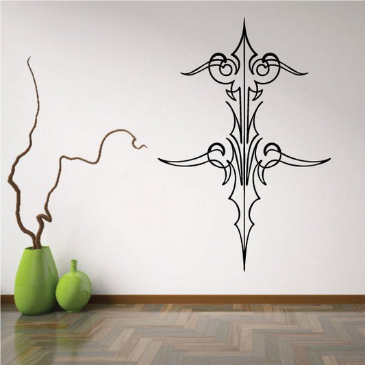 Ornate black vinyl wall decal with pointed spear top and scroll accents