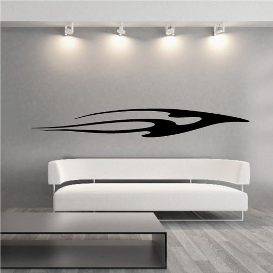 Black vehicle pinstripe vinyl decal with flame-style swoosh, flat on wall