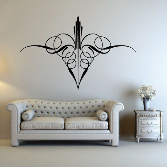 Vinyl pinstripe vinyl decal, black tribal flourish with central teardrop and curved rings