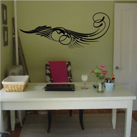 Vehicle pinstripe vinyl decal, black swirl with wings and circular accents