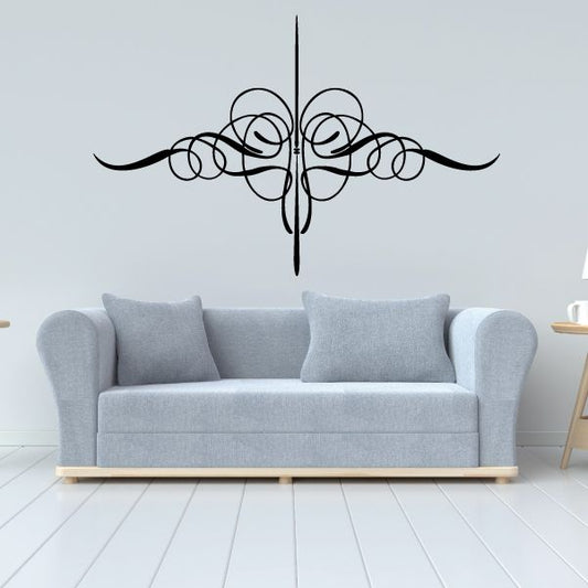 Black pinstripe vehicle decal with symmetrical swirl scrolls and center line