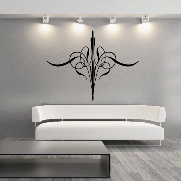 Black ornate pinstripe vinyl decal with stylized scrolls and central spear shape