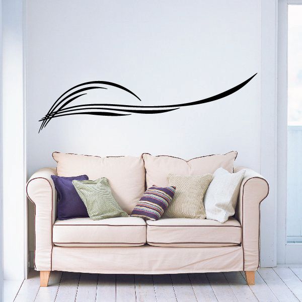 Vehicle pinstripe vinyl decal with black swoosh line design on wall