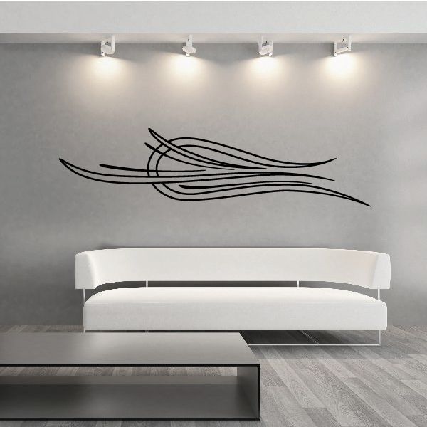 Vehicle pinstripe vinyl decal with black sweeping stripe lines on wall