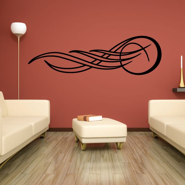 Vehicle pinstripe vinyl decal, black swoosh design with circular emblem.