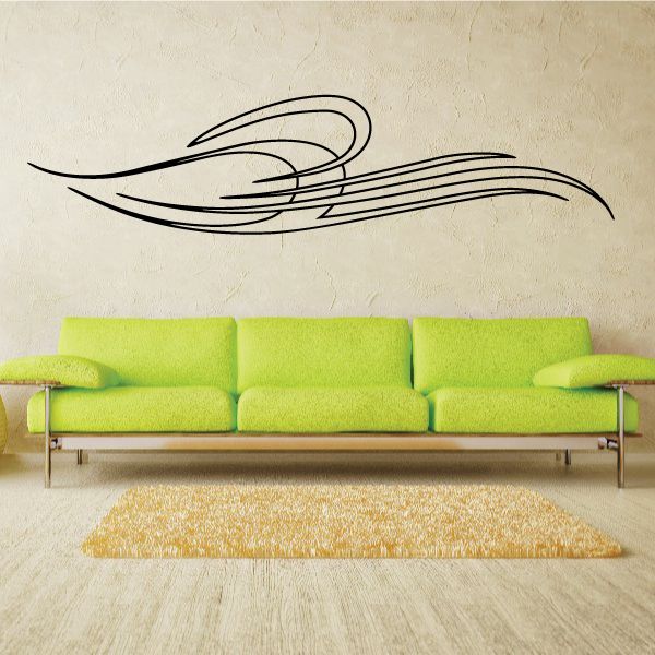 Vehicle pinstripe vinyl decal with sweeping racing stripe lines, black on wall
