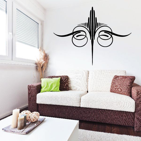 Black pinstripe vinyl decal with ornate vertical emblem and scroll accents