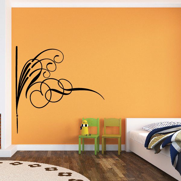 Vehicle pinstripe vinyl decal with black swirl lines on wall