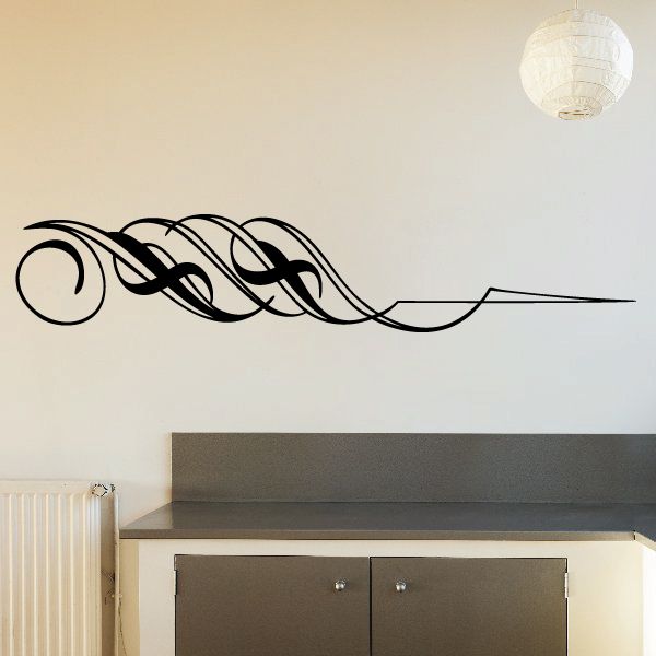 Black vehicle pinstripe vinyl decal with curving ornamental scroll lines
