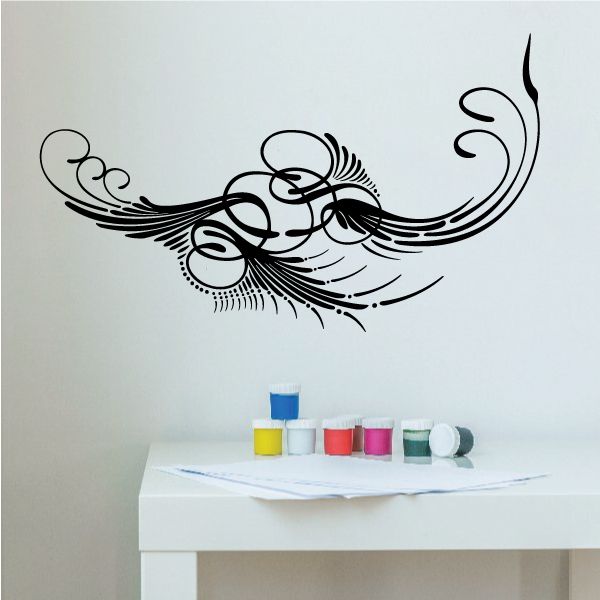 Vehicle pinstripe vinyl decal with black ornamental swirl and winged stripes
