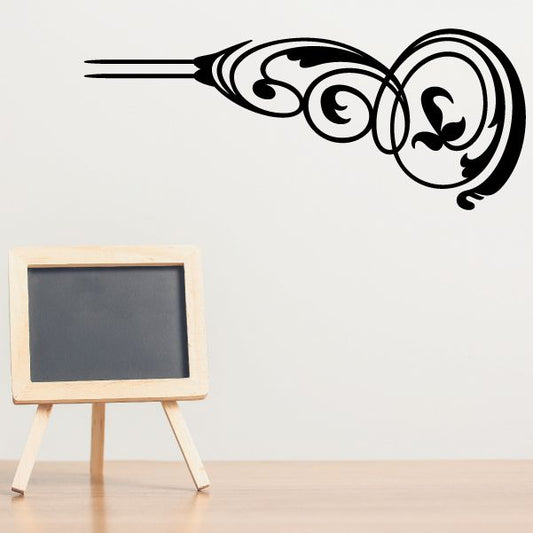 Vinyl pinstripe vehicle decal with black swirling swirl and curved scroll pattern