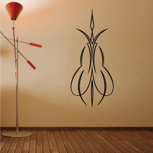 Vinyl pinstripe vehicle decal with black stylized floral emblem outline