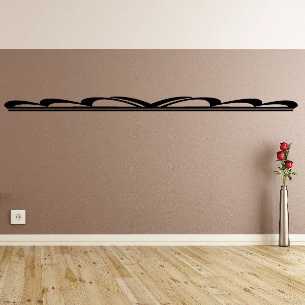 Pinstripe vinyl decal with black curved stripes on a smooth wall