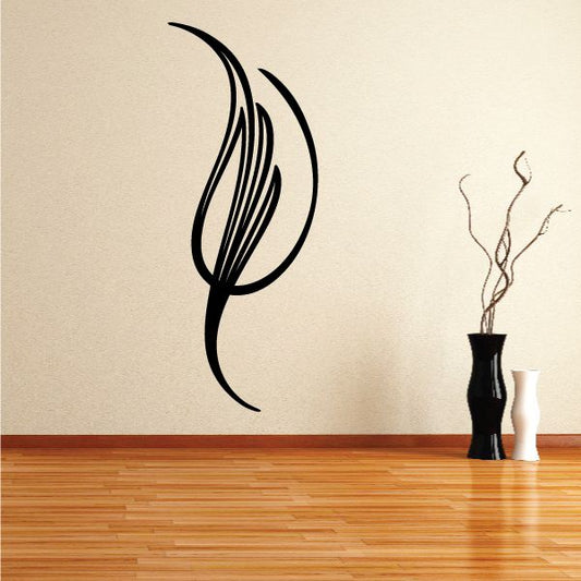 Black vehicle pinstripe vinyl decal with curved swirl lines on wall