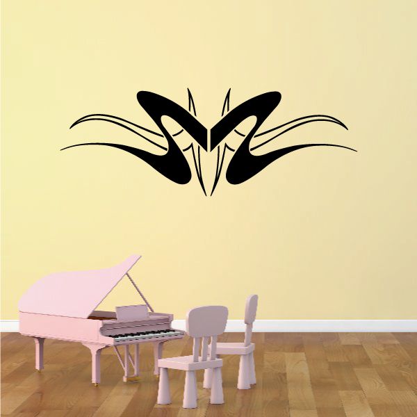 Vehicle pinstripe vinyl decal, black tribal-style graphic with sharp wing shapes