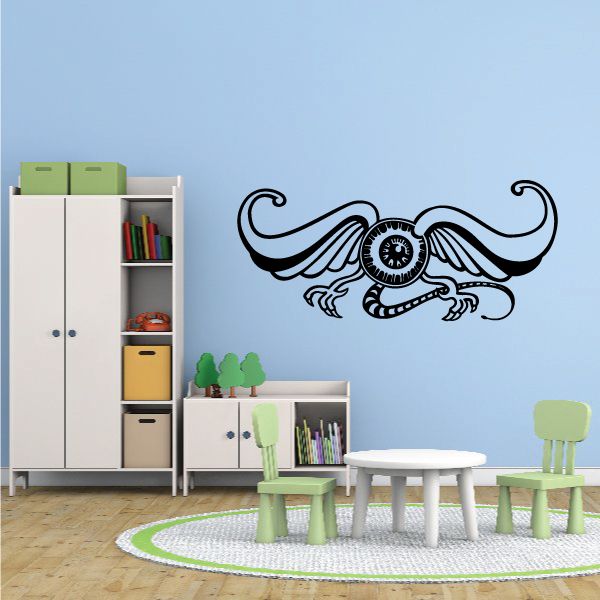 Ornate pinstripe vinyl wall decal with circular emblem and winged scrolls