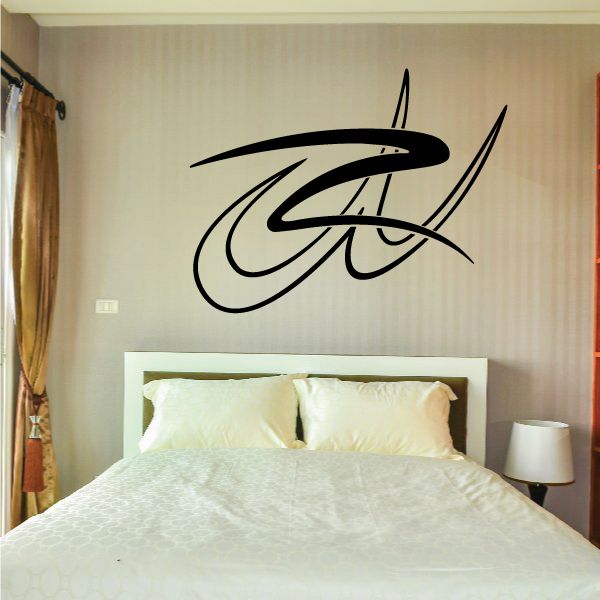 Black pinstripe vinyl decal with stylized vehicle script on wall