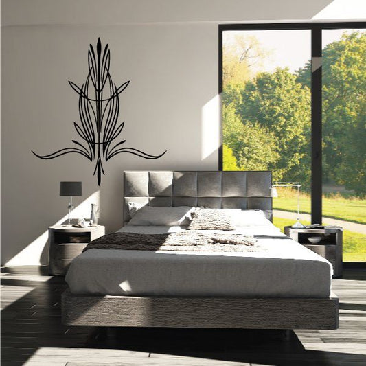 Black pinstripe vinyl decal graphic with tall feather-like line design on wall