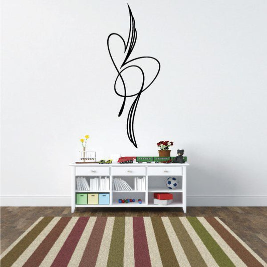 Black vinyl pinstripe-style flourish wall decal