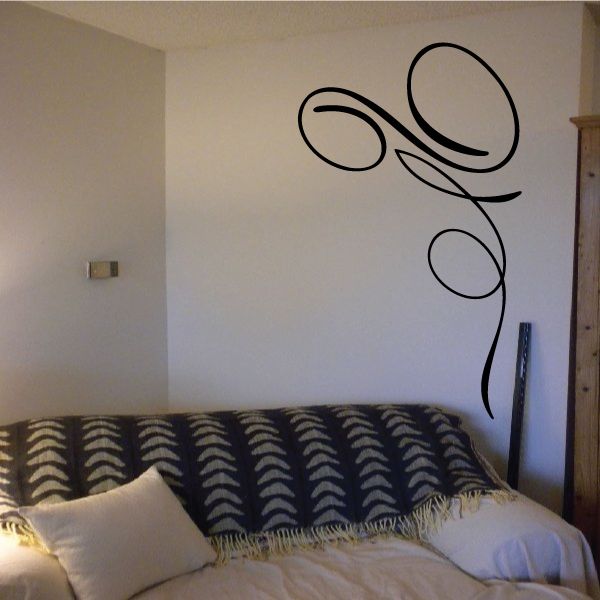 Black vehicle pinstripe vinyl wall decal with curving circle line design