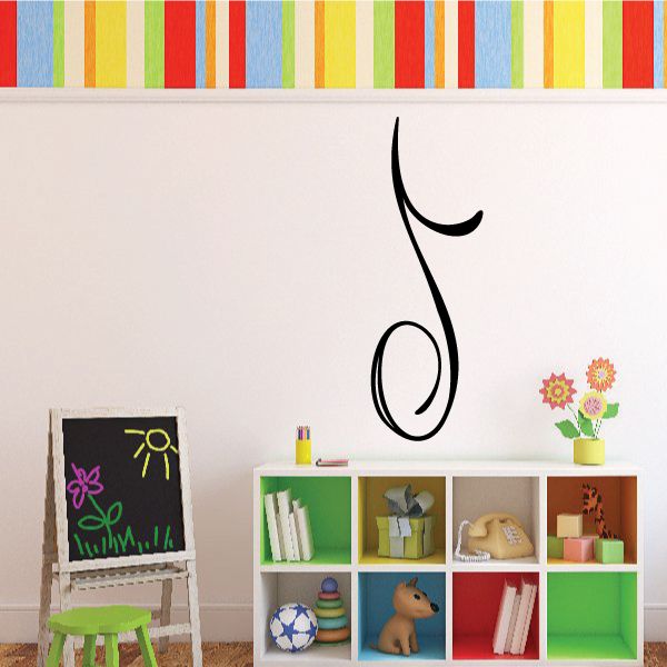 Black curvy pinstripe vinyl decal with looped swoosh on white wall