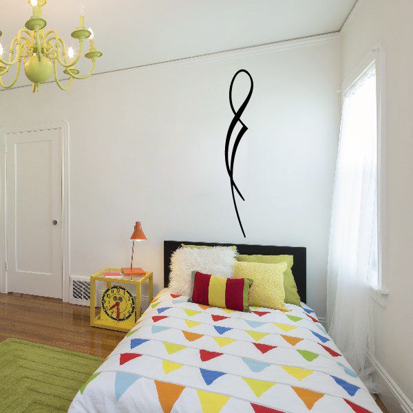 Black pinstripe vinyl decal with curved ampersand-style swoosh on wall