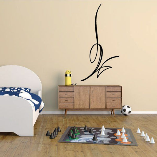 Black pinstripe vinyl decal with swooping flame-like outline on wall
