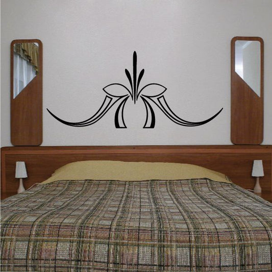 Black pinstripe vinyl decal with floral center and curved trim lines
