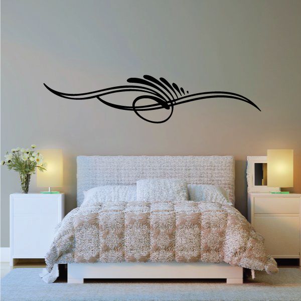 Vehicle pinstripe vinyl decal: black scroll and swoosh stripe design on wall
