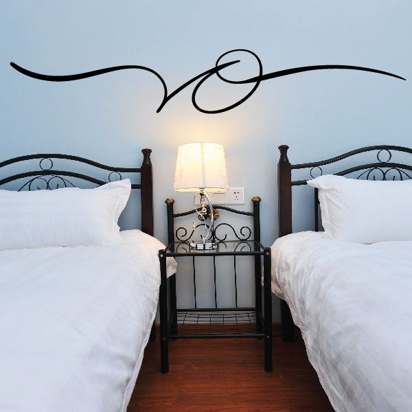 Black pinstripe vinyl decal with number 8 swirl design on wall