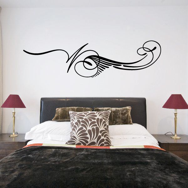 Black pinstripe vinyl car decal with swirl and decorative lines on wall