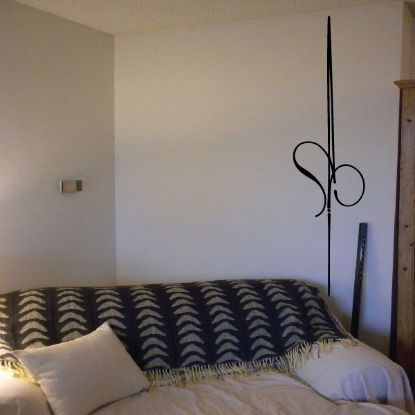 Vinyl wall decal with black pinstripe swoosh and vertical line