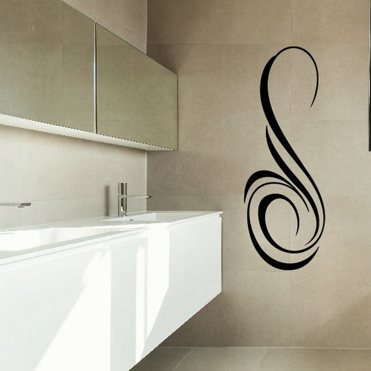 Vehicle pinstripe vinyl decal, black swirl on wall, curved ribbon design