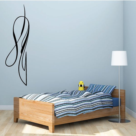 Black pinstripe vinyl decal with looping swoosh design for walls