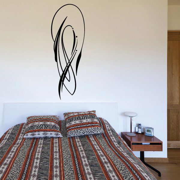 Black pinstripe vinyl decal with flame-like swoosh graphic on wall