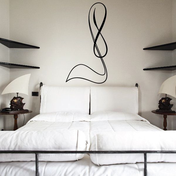 Black pinstripe vinyl decal shaped like a curving number 8