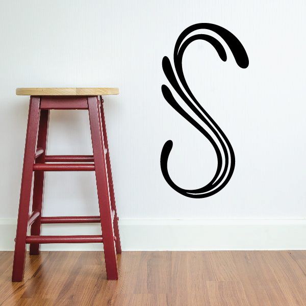 Vinyl pinstripe decal with black outlined letter S shape