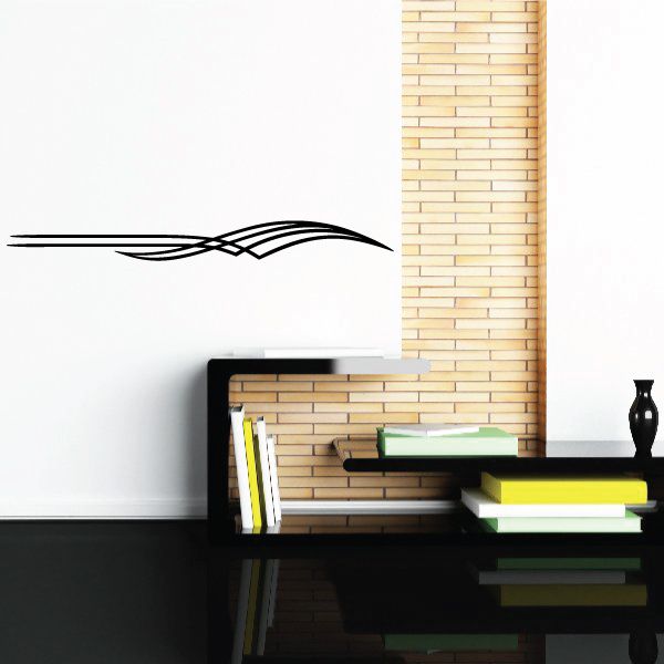 Vehicle pinstripe vinyl decal with black racing stripe graphic on light wall