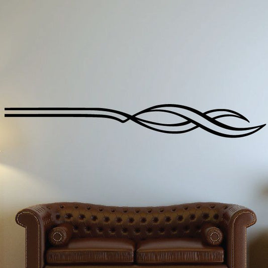 Black pinstripe vinyl vehicle decal with flowing swoosh lines and leaf-like tail