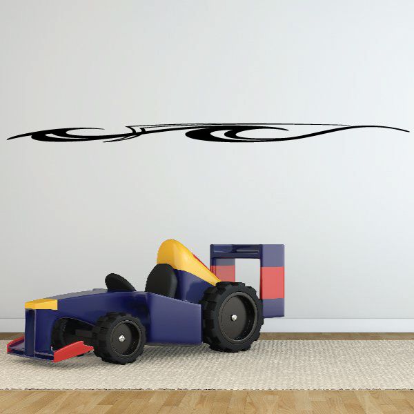 Vehicle pinstripe vinyl decal, black flame-like stripe graphic on flat surface