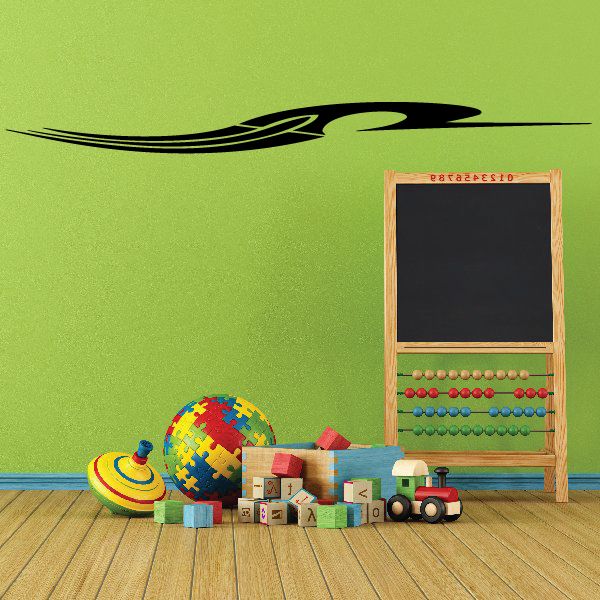Black vehicle pinstripe vinyl decal with swoosh flame-like graphic on wall